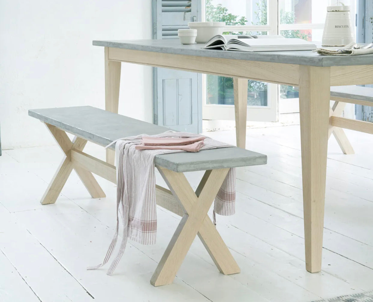 Loaf Extra Large Budge Dining Bench with a smooth weathered oak frame and a grey composite resin top.