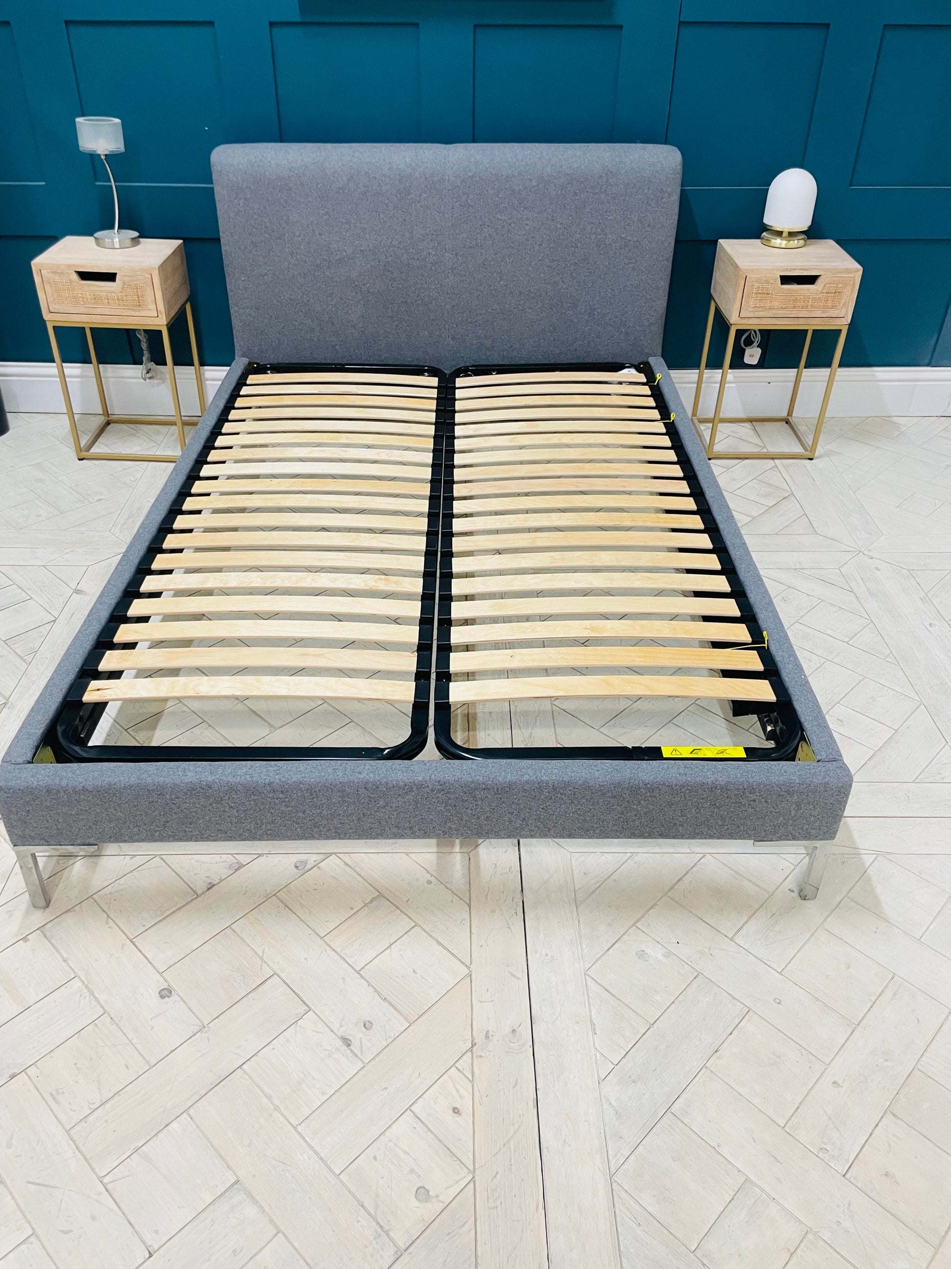 Loaf double bed frame with a contemporary upholstered grey fabric headboard and footboard, featuring a sleek polished chrome frame