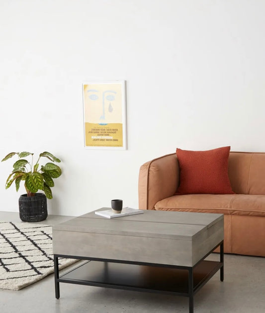 Lomond lift top coffee table in grey washed mango wood featuring a raised top and internal storage
