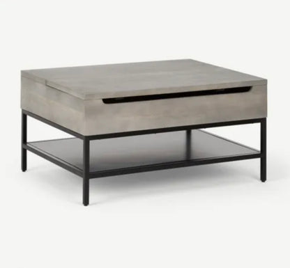 Lomond lift top coffee table in grey washed mango wood featuring a raised top and internal storage