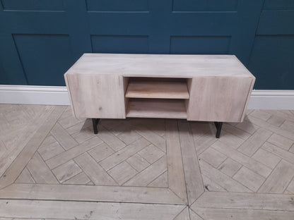 Made.com Aphra TV Stand in Light Mango Wood with Black Powder-Coated Iron Legs.