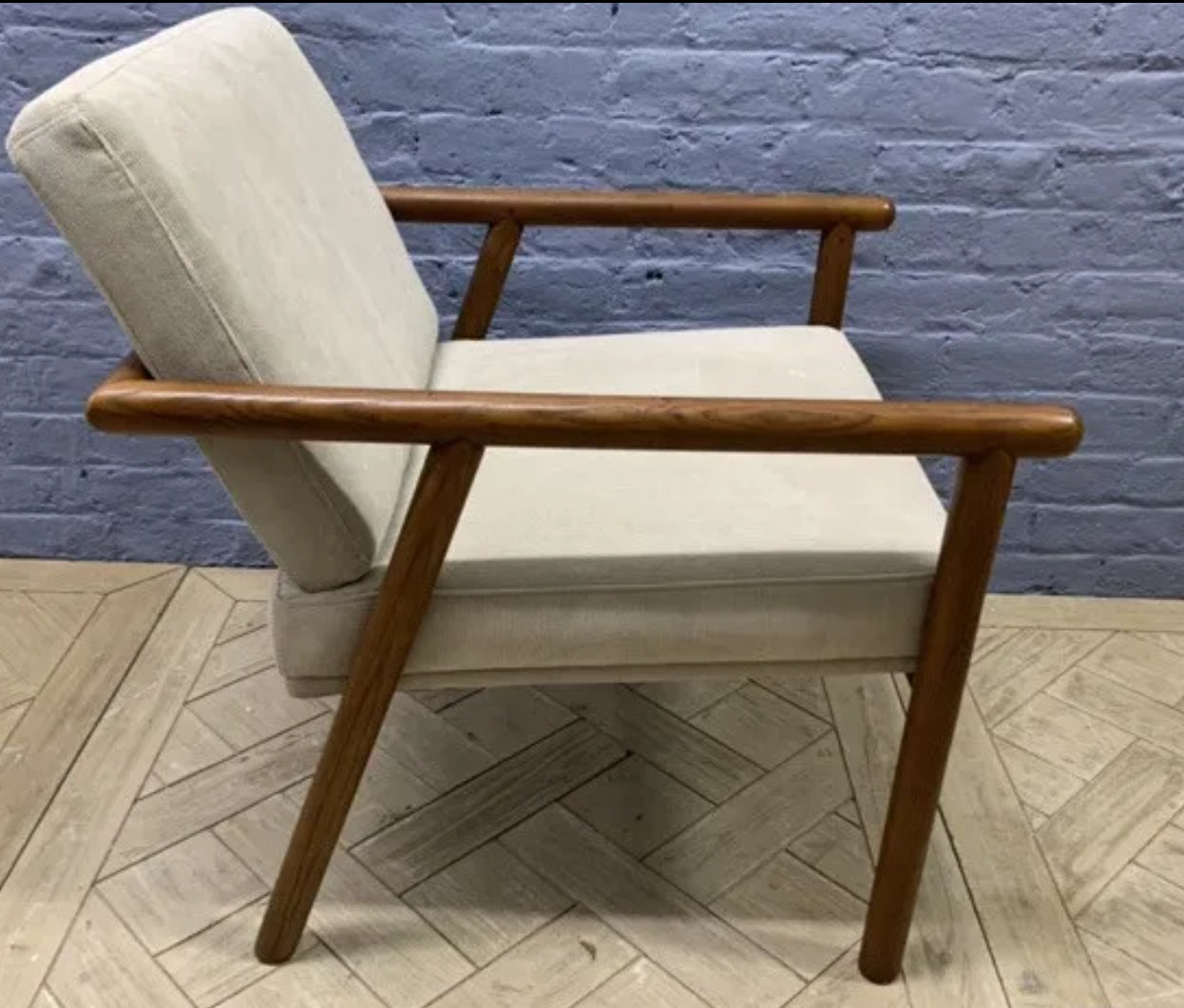 Mid-century style Lars accent chair in stone grey fabric and dark walnut wood finish.