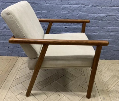 Mid-century style Lars accent chair in stone grey fabric and dark walnut wood finish.