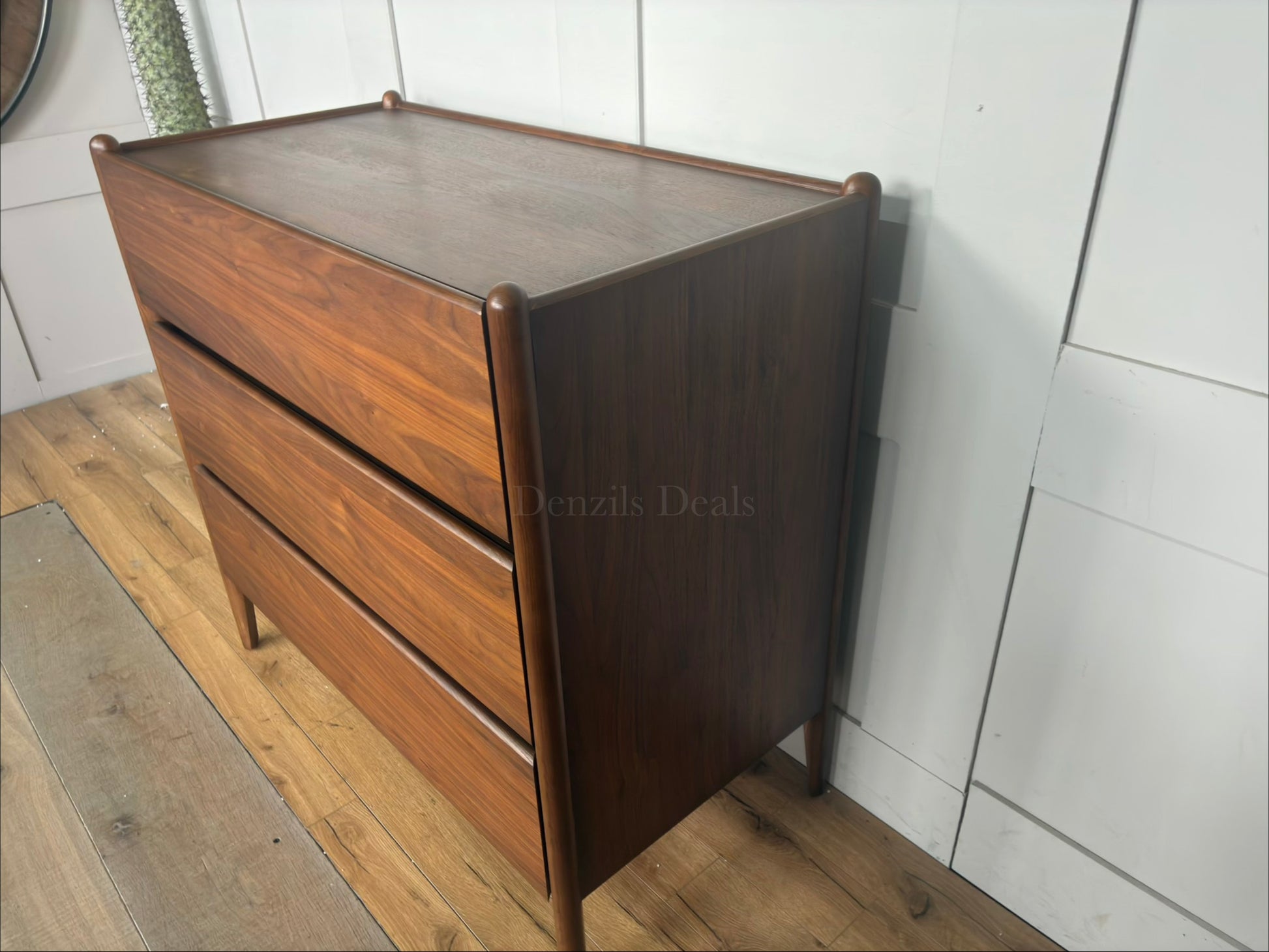 Side view Minimalist mid-century modern 3-drawer dresser by John Lewis, crafted from wood with a warm walnut stain, tray-edge top, and sleek handle-less design."