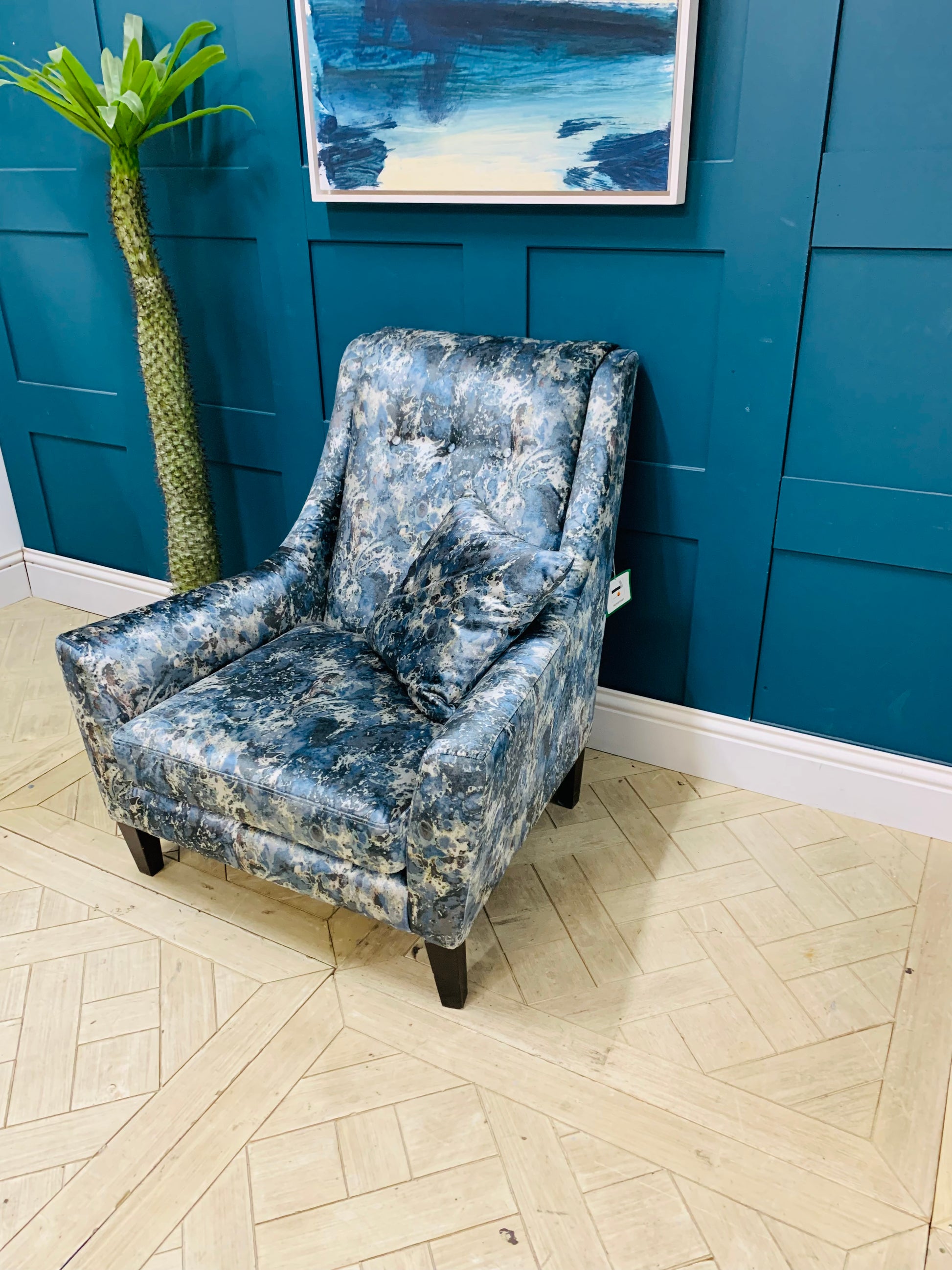 Modern Sinatra accent chair featuring curved backrest and button-tufted upholstery