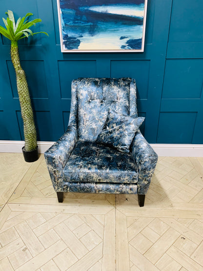 Modern Sinatra accent chair featuring curved backrest and button-tufted upholstery
