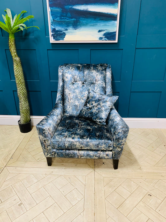 Modern Sinatra accent chair featuring curved backrest and button-tufted upholstery