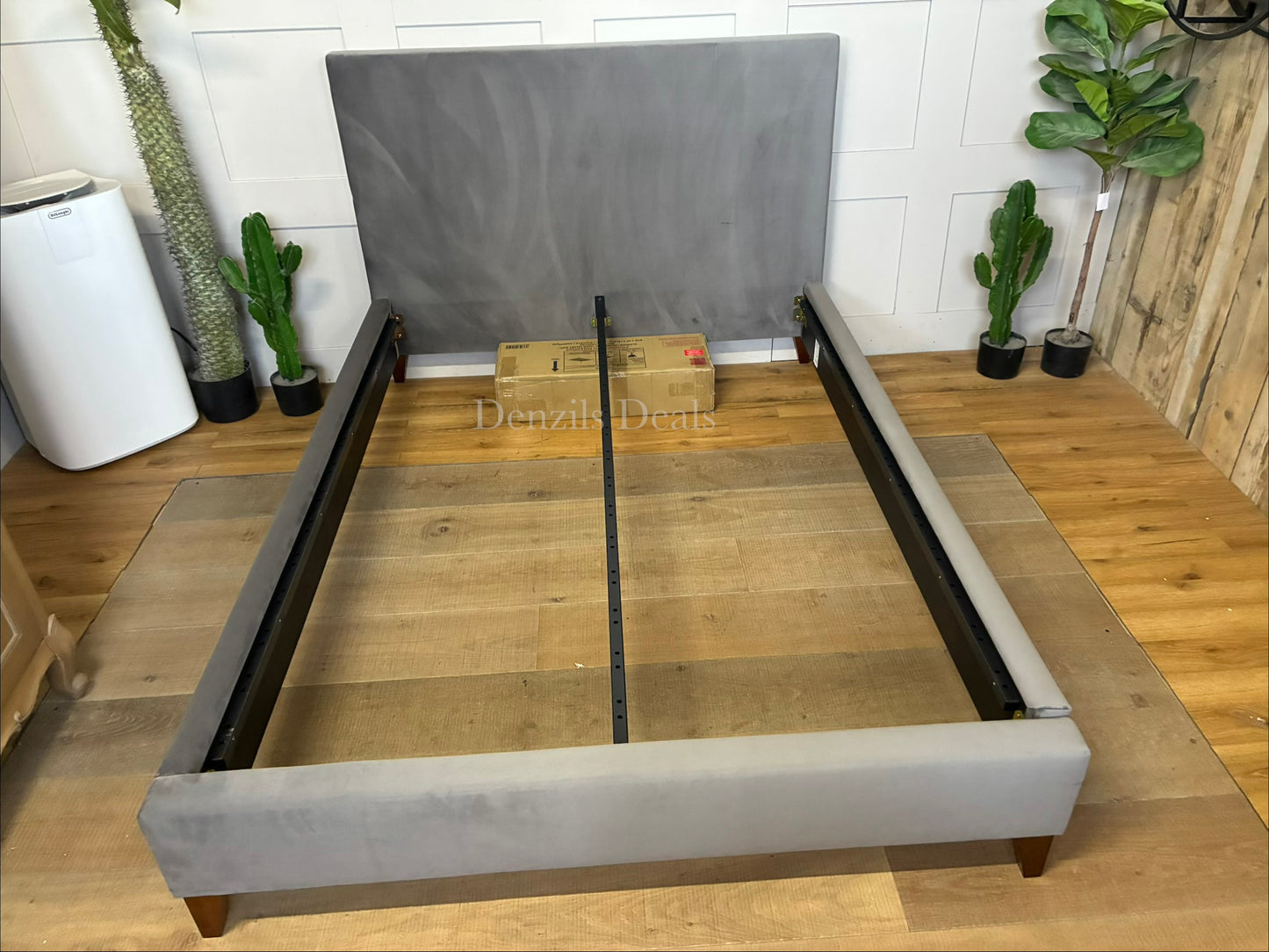 Modern double bed frame with a simple, clean-lined headboard, upholstered in plush Deep Velvet Steel grey fabric.