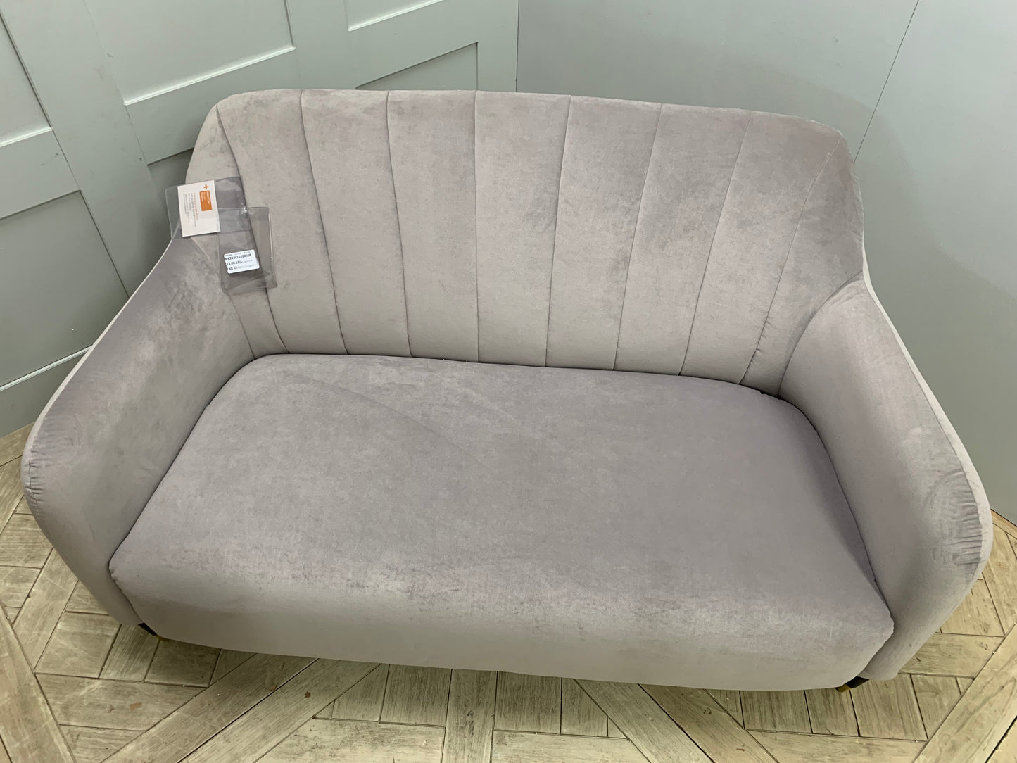 Modern living room styled with a John Lewis Meghan fluted back petite velvet sofa and dark legs