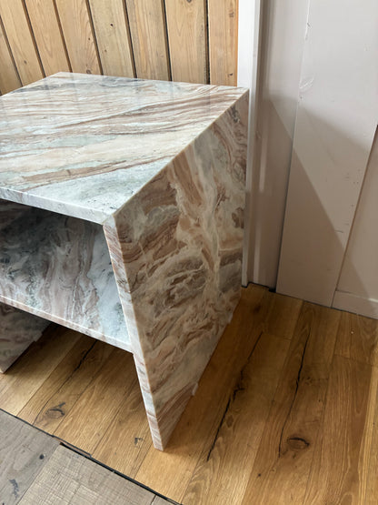 Modern minimalist cube side table crafted from solid natural marble with distinct grey veining. The table features an open, hollow center with thick marble slabs forming the top, sides, and base, offering a clear view through the open sides