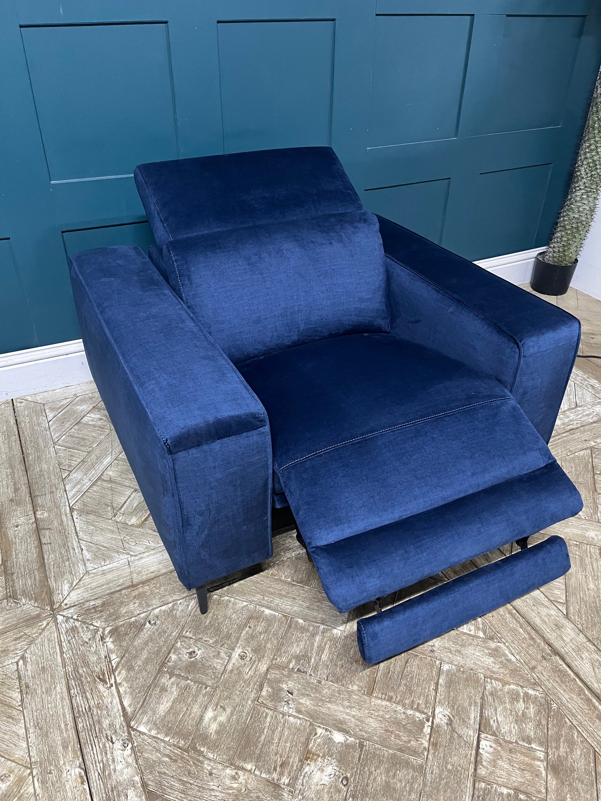 Modern navy blue chenille power recliner with contemporary metal legs for a living room