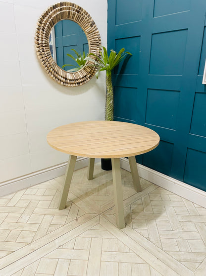 Modern round oak and grey dining table from the Eton collection by Gallery Direct. 