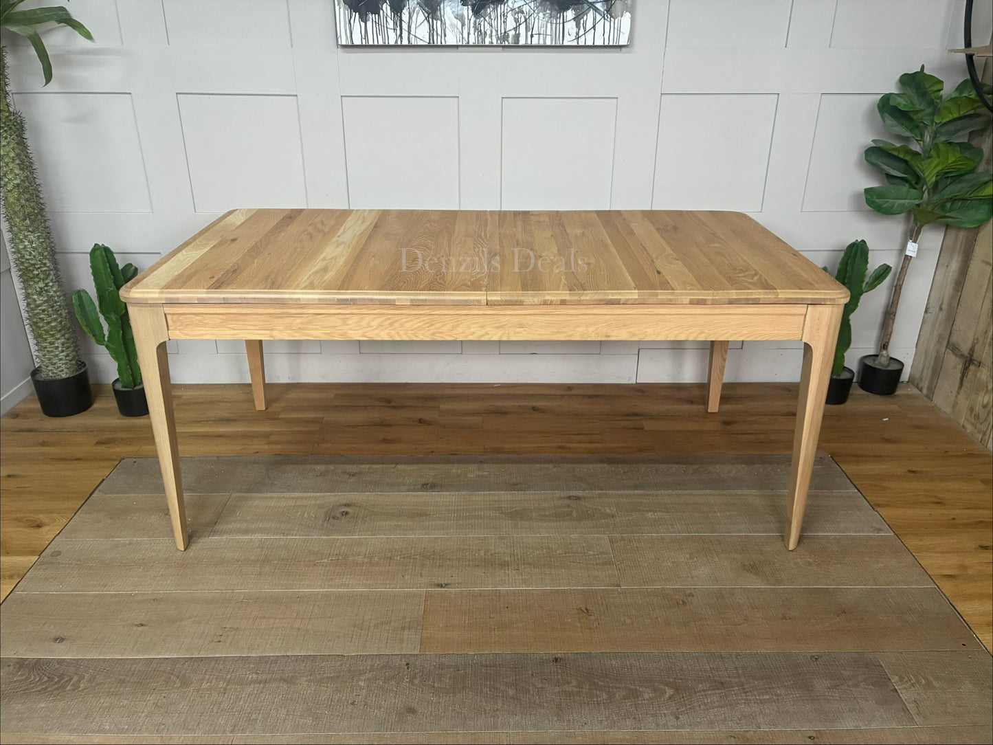 Upgrade your dining space with the NEWTON Light Natural Solid Oak Extendable Table (6-8 seater). Classic farmhouse style, solid wood. Selling at half price 