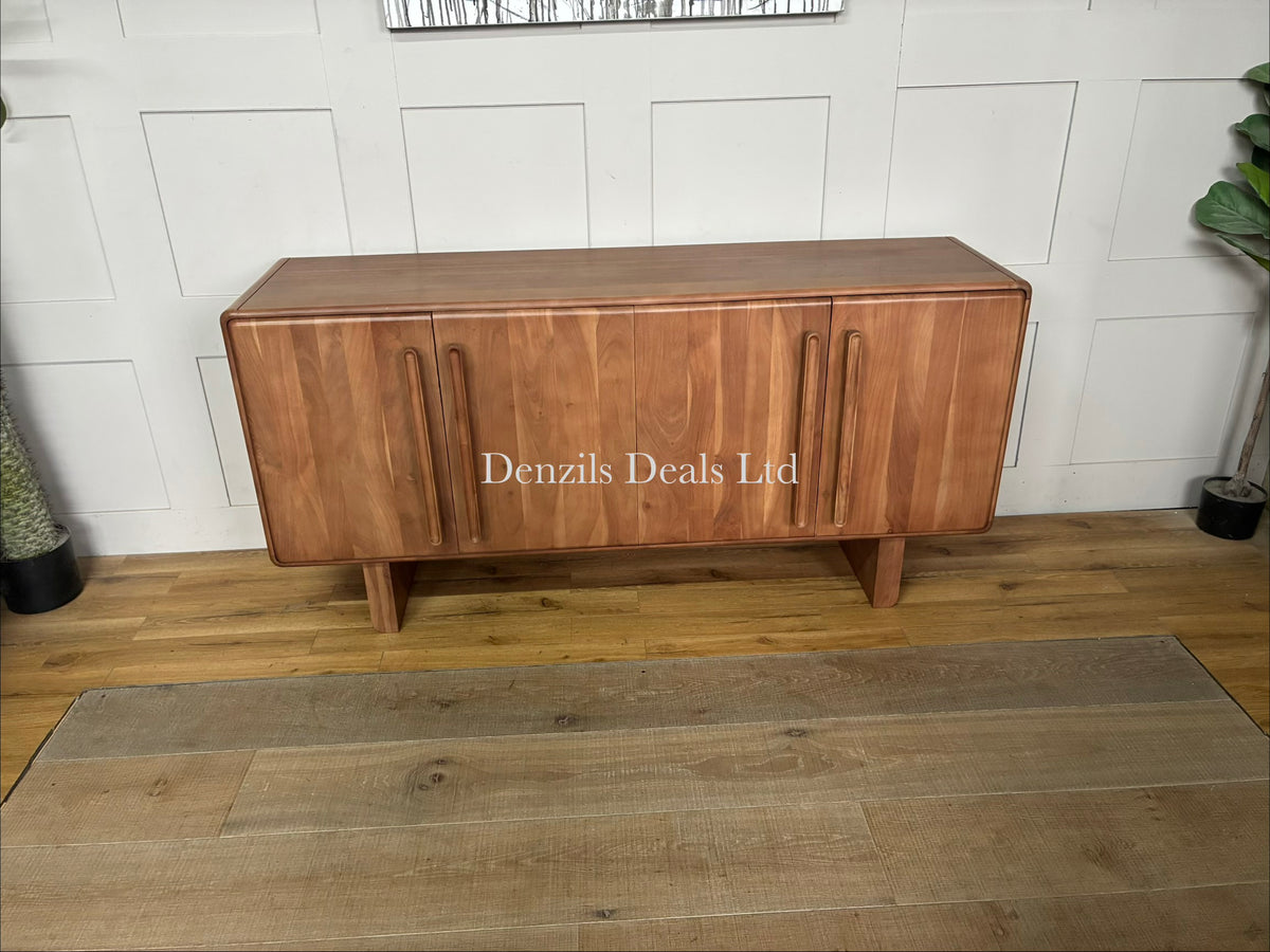 Natural acacia wood four-door sideboard with softly rounded edges, a vertical panelled design, and discreet cable holes at the back