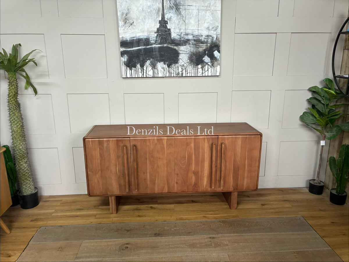 Natural acacia wood four-door sideboard with softly rounded edges, a vertical panelled design, and discreet cable holes at the back