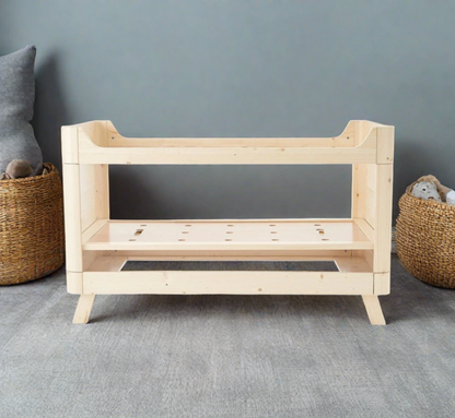 Sazy Baby Cot Bed in natural , Suitable From Birth To 18months+, beige baby cot bed with clear acrylic sides and a wooden frame,