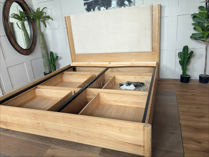 Natural wood super king John Lewis Rest bed frame with four storage drawers and a padded headboard.