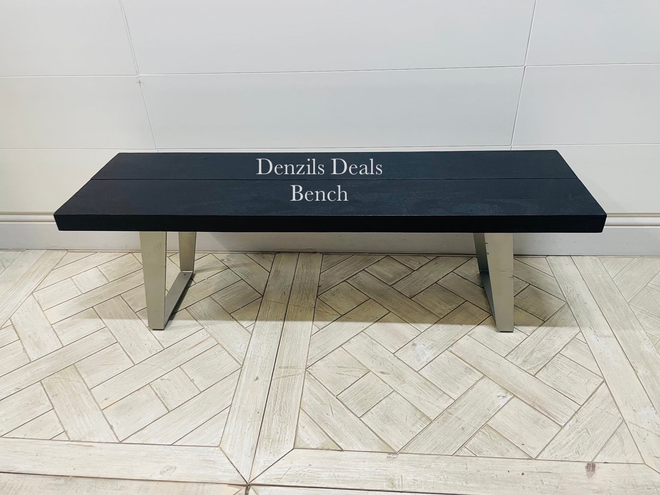 Newington Black Dining Table (180cm) & Bench, Small By Gallary Direct
Solid black acacia wood top
Angular metal legs
Seat 4 - 6 people

