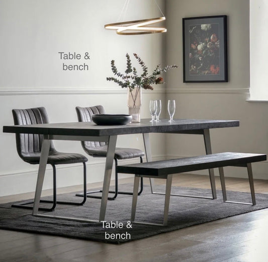 Newington Black Dining Table (180cm) & Bench, Small By Gallary Direct
Solid black acacia wood top
Angular metal legs
Seat 4 - 6 people

