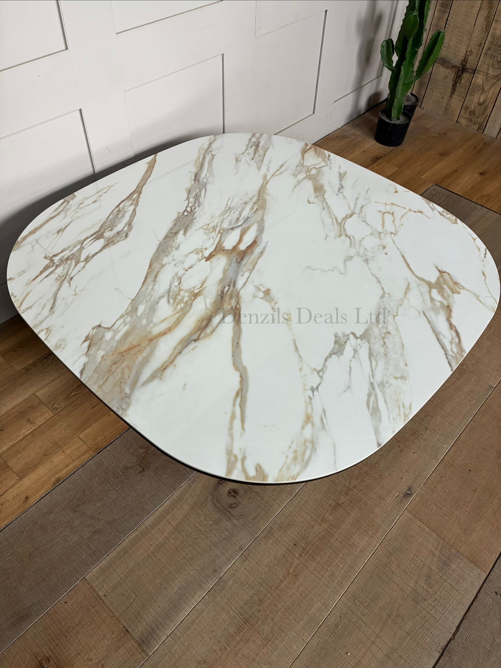 Nick Scali Allegria square coffee table with a smooth, marble-patterned ceramic top and softly rounded corners, set upon a sculptural, fluted smoked oak base.