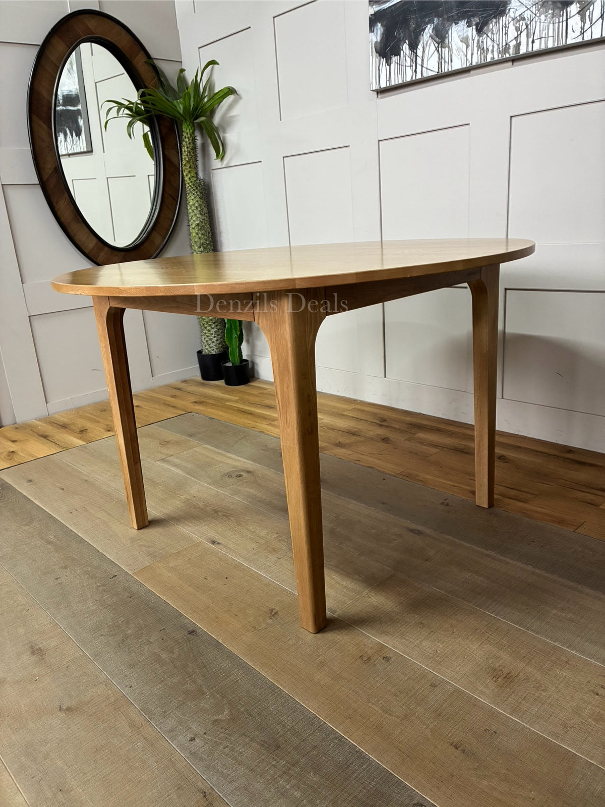 OAK ROUND DINING TABLE 120CM DURHAM NATURAL By OAK FURNITURELAND is a Scandinavian-inspired, solid oak piece designed with gently curved legs and a clear natural finish that highlights the authentic wood grain.