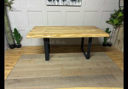 Oak Furnitureland Brooklyn 8-seater oak dining table with live edges and industrial metal legs.
