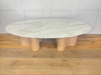 Parc Oval Coffee Table by Nick Scali with a marble top and customized alternative legs."