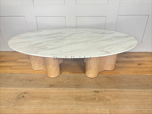 Parc Oval Coffee Table by Nick Scali with a marble top and customized alternative legs."