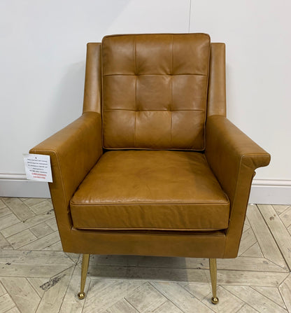 Saltford brown leather accent chair with button-back and gold legs"
