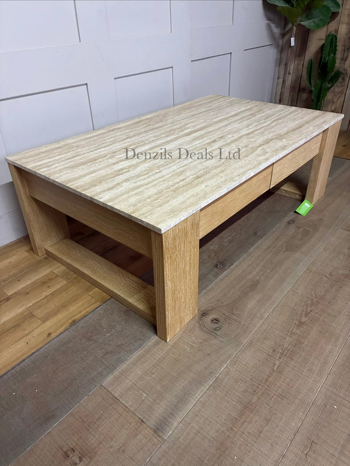 Modern rustic rectangular coffee table with a cream stone top, a grey-beige wood frame, and built-in drawersBuy pottery barn