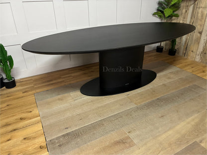 The Richmond Interiors Gordon Dining Table in Dark Coffee wood with a modern black metal structural base."