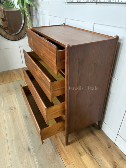 John Lewis Scandi 5 Drawer Wood Chest, Walnut Finish with five storage drawers and the top surface has a slight tray-edge design so your bedside essentials stay secure. Rounded posts, tapered legs and sleek, handle-less drawers all honour Scandinavian design principles, so it's perfect for keeping your bedroom a calm, uncluttered and simple space.