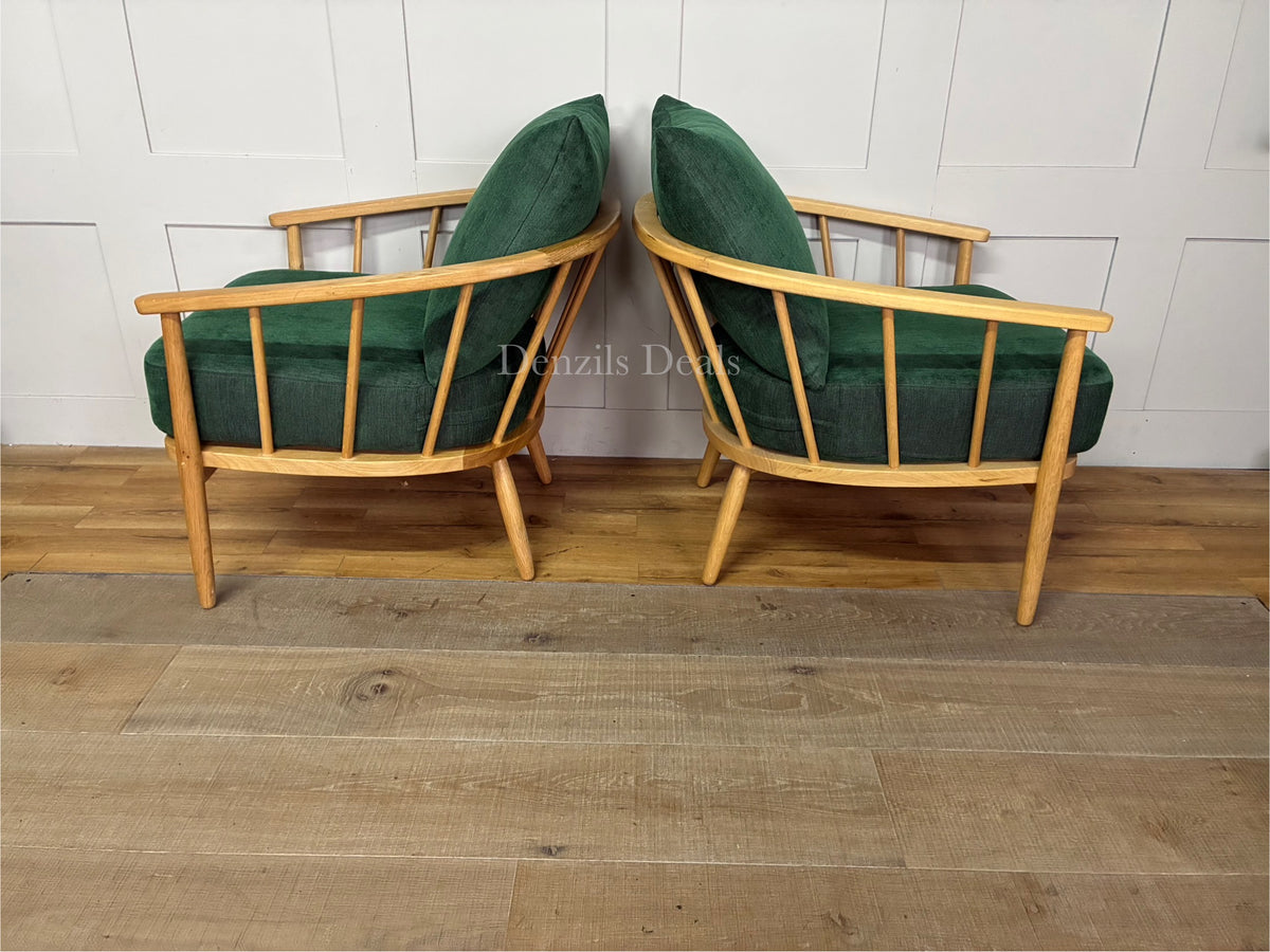 Set of two John Lewis Frome armchairs in forest green fabric with visible wood frames.