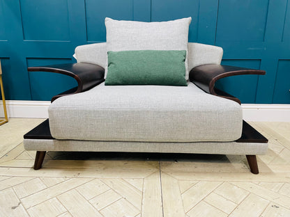 Shine Mount Ricci modern grey upholstered statement armchair with fabric cushions. Giving a luxurious feel 