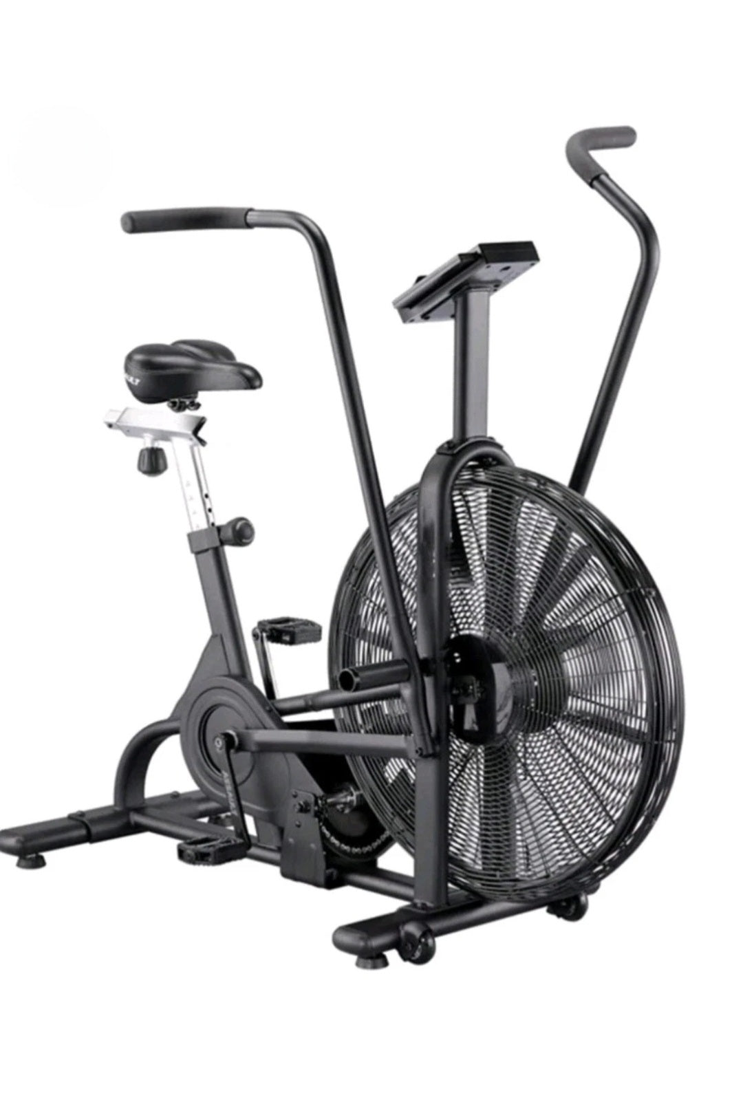 Side profile of a stationary air resistance bike featuring moving dual-action arm handles, a large front fan wheel, and an adjustable padded seat. The unit includes a clear LCD display panel and textured foot pegs on a heavy-duty steel frame.