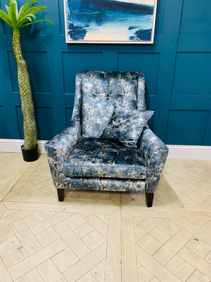 Modern Sinatra accent chair featuring curved backrest and button-tufted upholstery