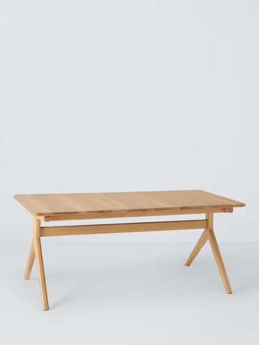 Solid oak 6-10 seater extending dining table with rounded edges and splayed legs