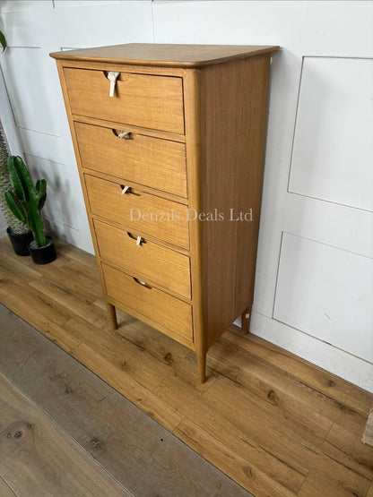 Solid oak Norway chest of drawers by Fishe & Lilly with five stacked drawers, clean Scandinavian lines, and a warm natural wood finish