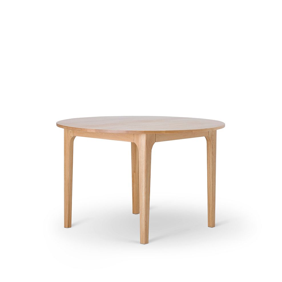 OAK ROUND DINING TABLE 120CM DURHAM NATURAL By OAK FURNITURELAND Constructed entirely from solid oak with a light, grain-enhancing natural finish.