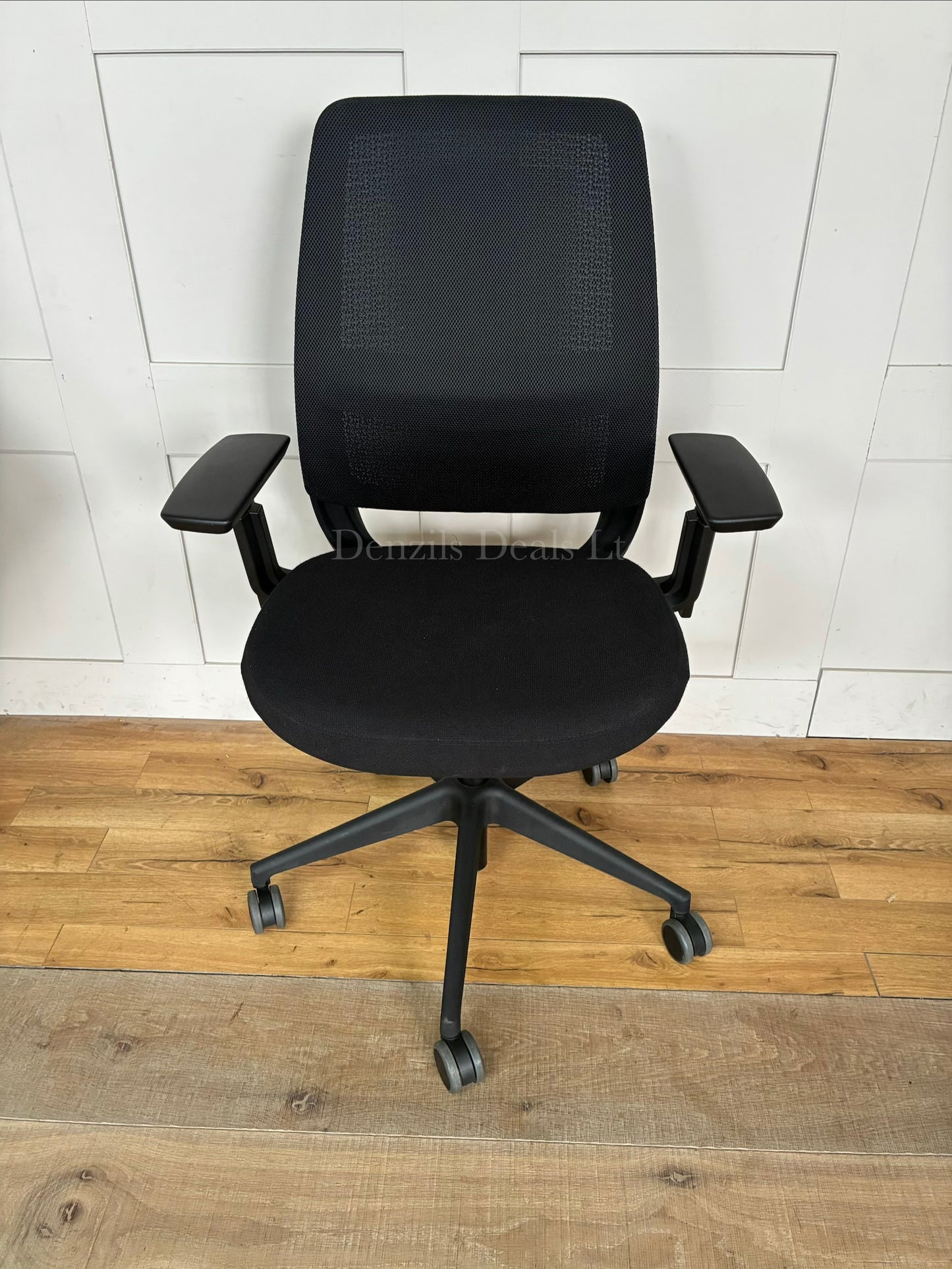 Steelcase Series 2 ergonomic office chair with a geometric Air LiveBack mesh back, 4D adjustable arms, and adjustable lumbar support.