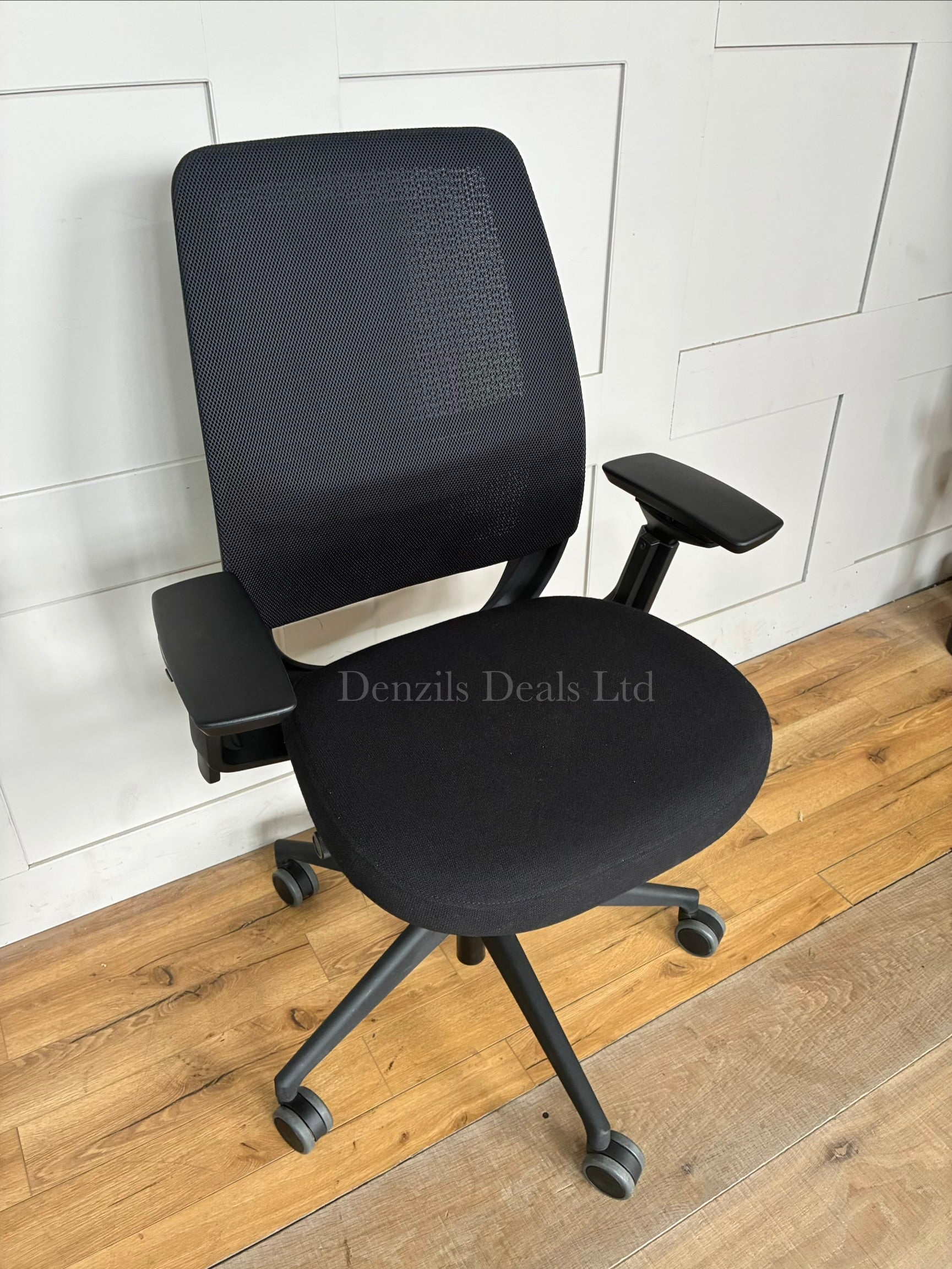 Steelcase Series 2 ergonomic office chair with a geometric Air LiveBack mesh back, 4D adjustable arms, and adjustable lumbar support.