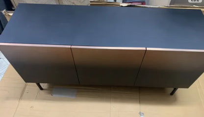 Made.com Sulta Wide Sideboard in Brass & Black Ombre with industrial-style black legs.