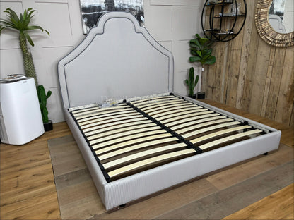 Super king bed frame Upholstered in a classic blue and white ticking stripe fabric with a heritage-inspired silhouette and tall headboard.