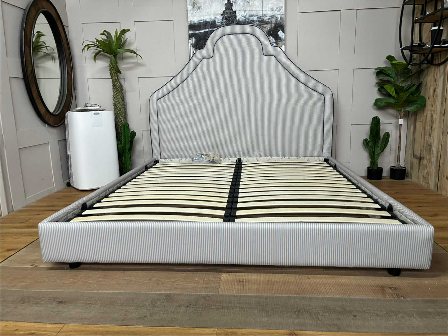 Super king bed frame Upholstered in a classic blue and white ticking stripe fabric with a heritage-inspired silhouette and tall headboard.