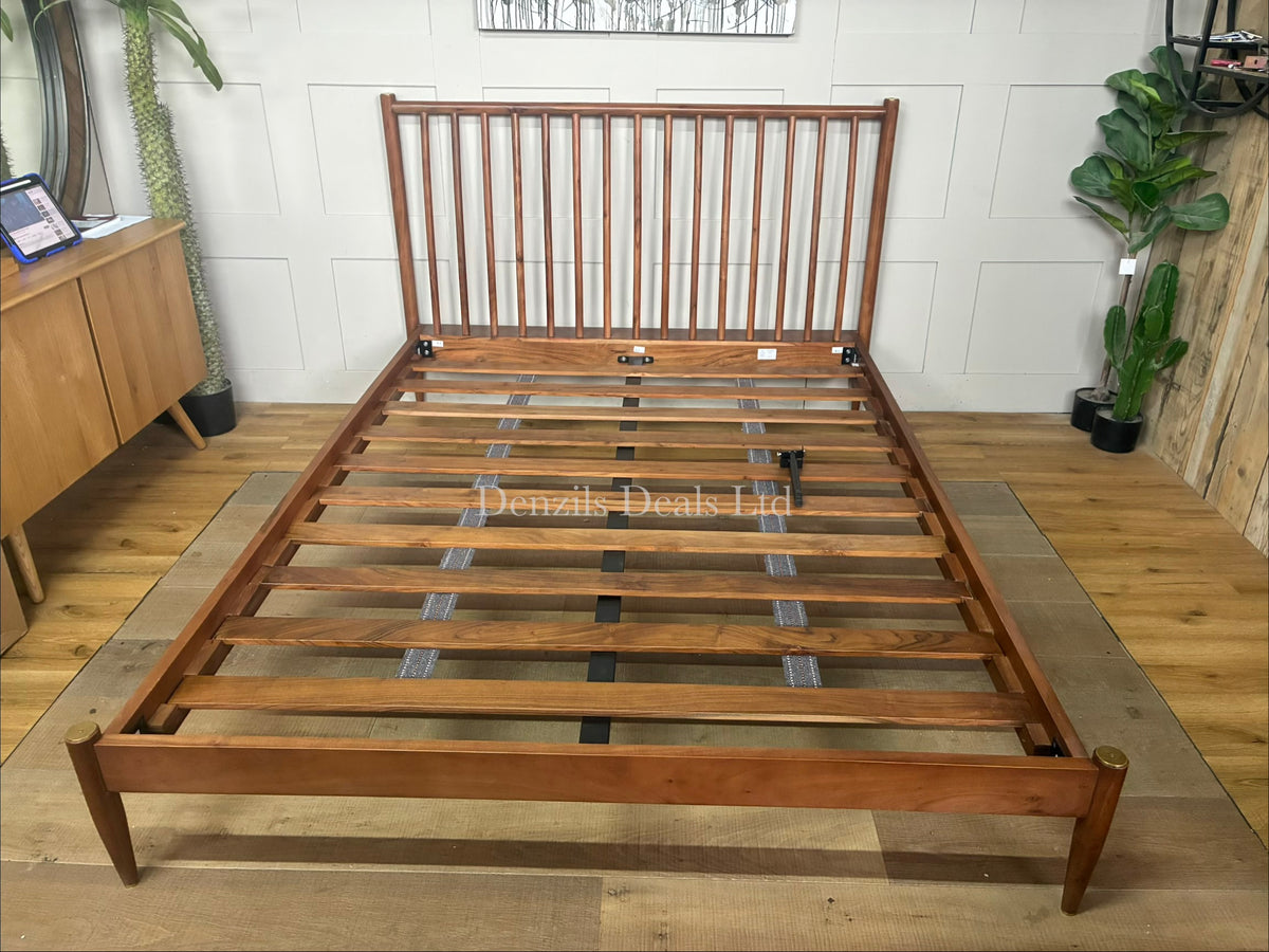 Swoon king-size wooden bed frame made from dark brown acacia wood, featuring a modern vertical-slatted spoked headboard.