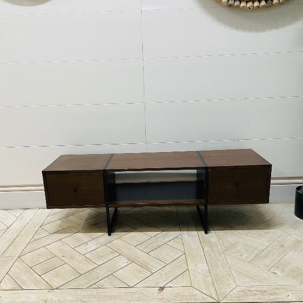 Swoon mid-century modern TV stand in dark walnut wood finish with tapered legs. Front view