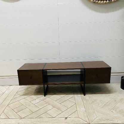 Swoon mid-century modern TV stand in dark walnut wood finish with tapered legs. Front view
