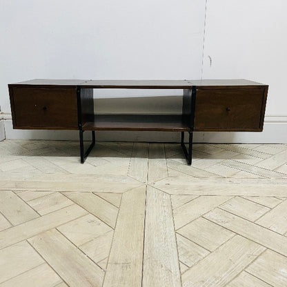 Swoon walnut TV cabinet styled in a modern living room with a large flat-screen TV and minimalist decor." Front view 