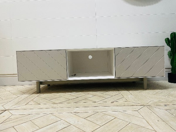 Content by Terence Conran Stanford TV stand with geometric diagonal grooves, a central shelf, and oak legs