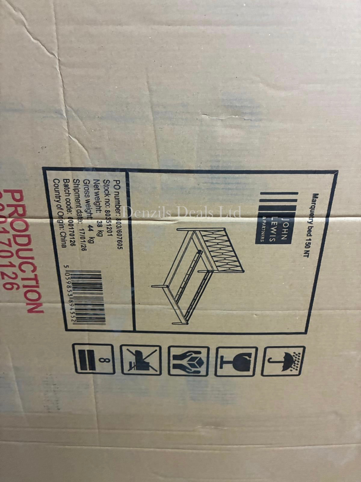 The John Lewis Marquetry King Size Bed Frame in a natural finish, showcasing a geometric wood-grain patterned headboard and tapered legs. New in box